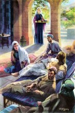 A woman washes the feet of Jesus